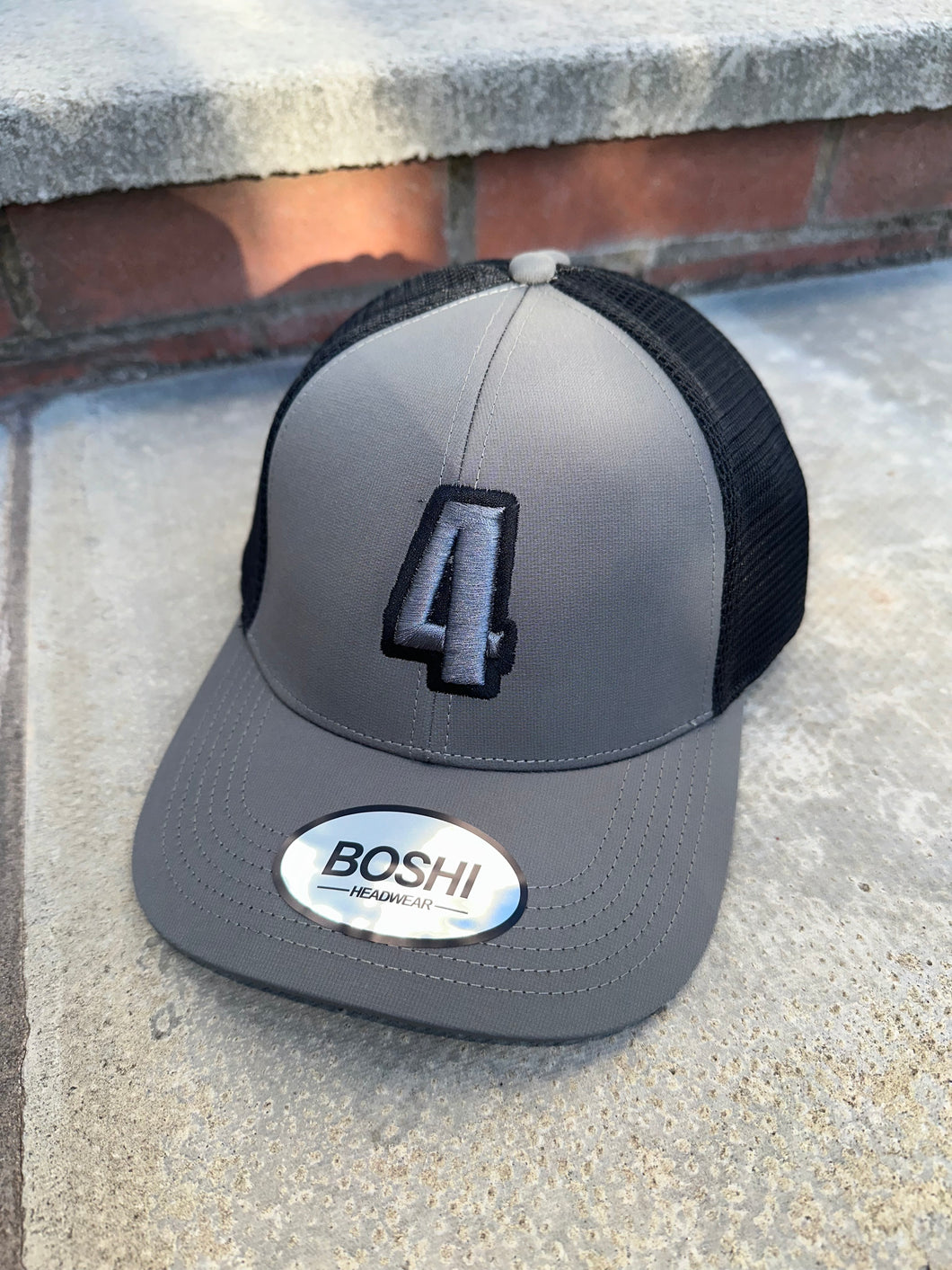 New Grey & bkack trucker cap with grey & black logo