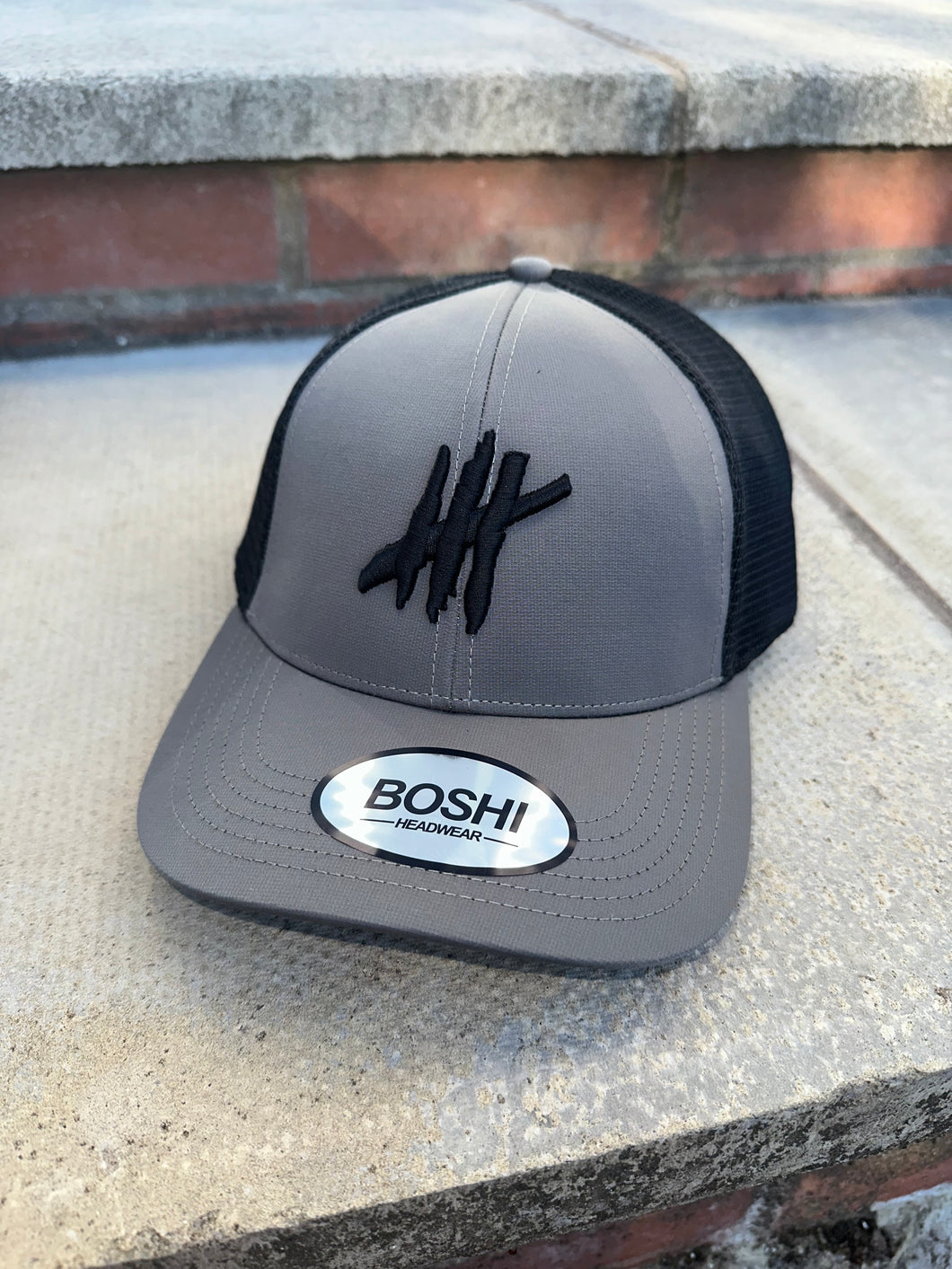 New Grey & bkack trucker cap with black logo