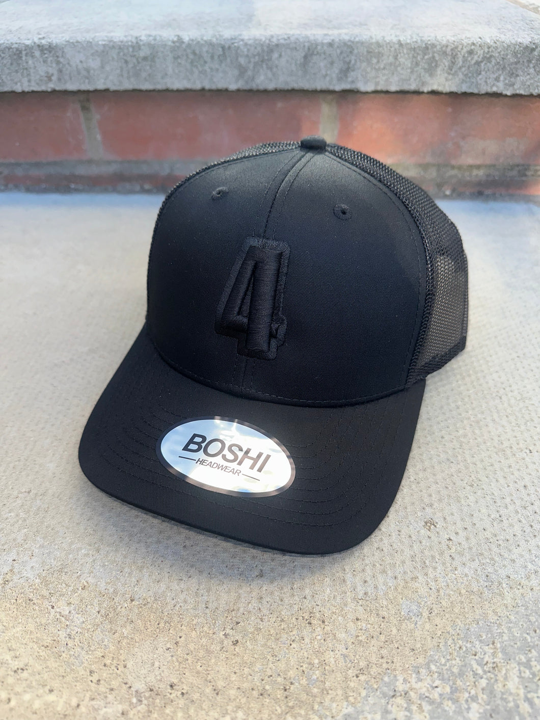 New Black trucker cap with black logo
