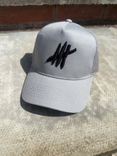 Load image into Gallery viewer, Black trucker youths cap with grey logo

