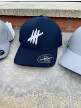 Load image into Gallery viewer, Navy delta flexfit cap with white logo
