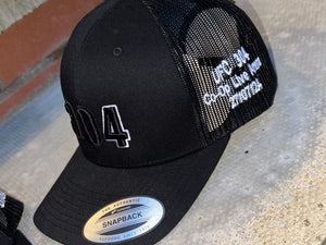 Black trucker cap with UFC 304 logo