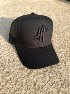 Black trucker youths cap with grey logo