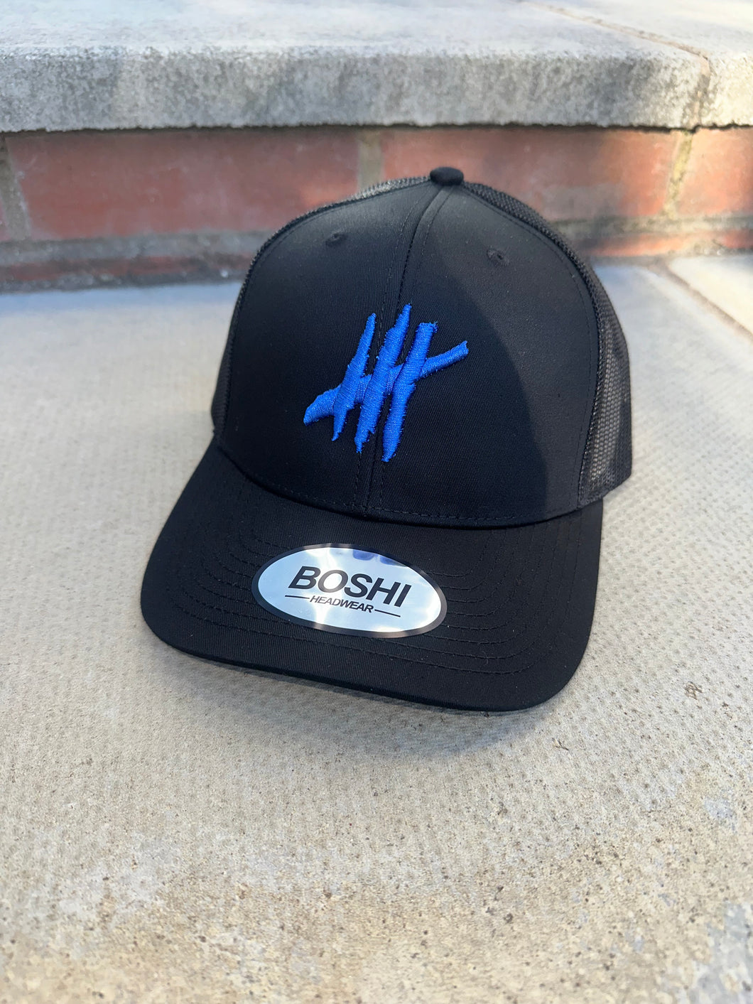 New Black trucker cap with blue logo