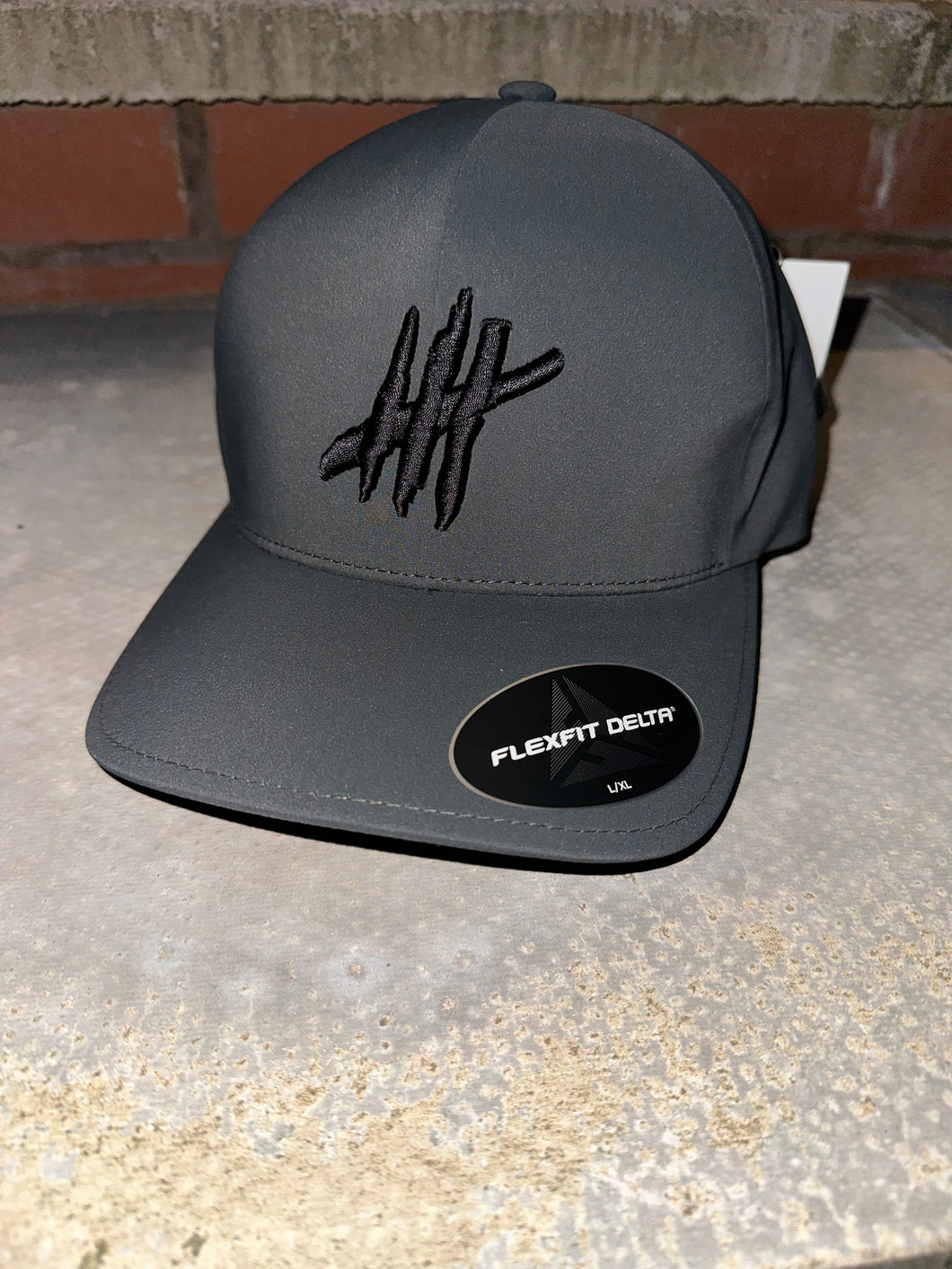 Charcoal delta flexfit cap with black logo