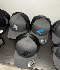 Grey & black trucker cap with grey logo