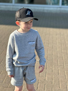 Black trucker youths cap with grey logo