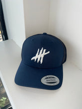 Load image into Gallery viewer, Navy trucker cap with white logo
