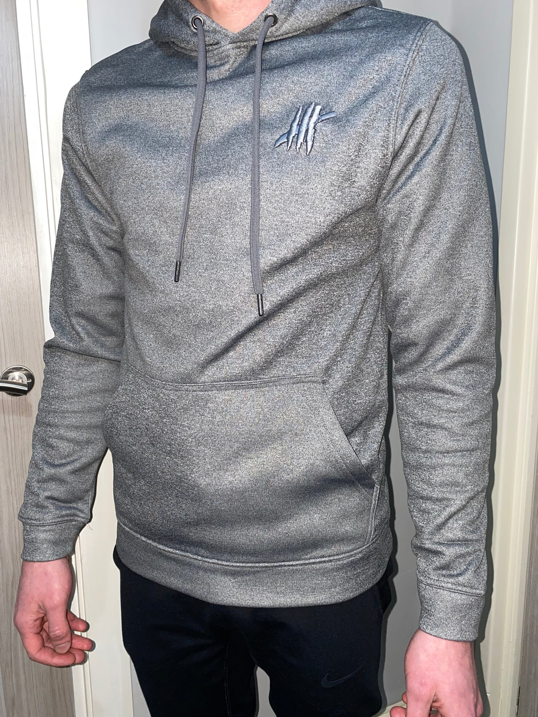 Grey sports hoodie with grey logo