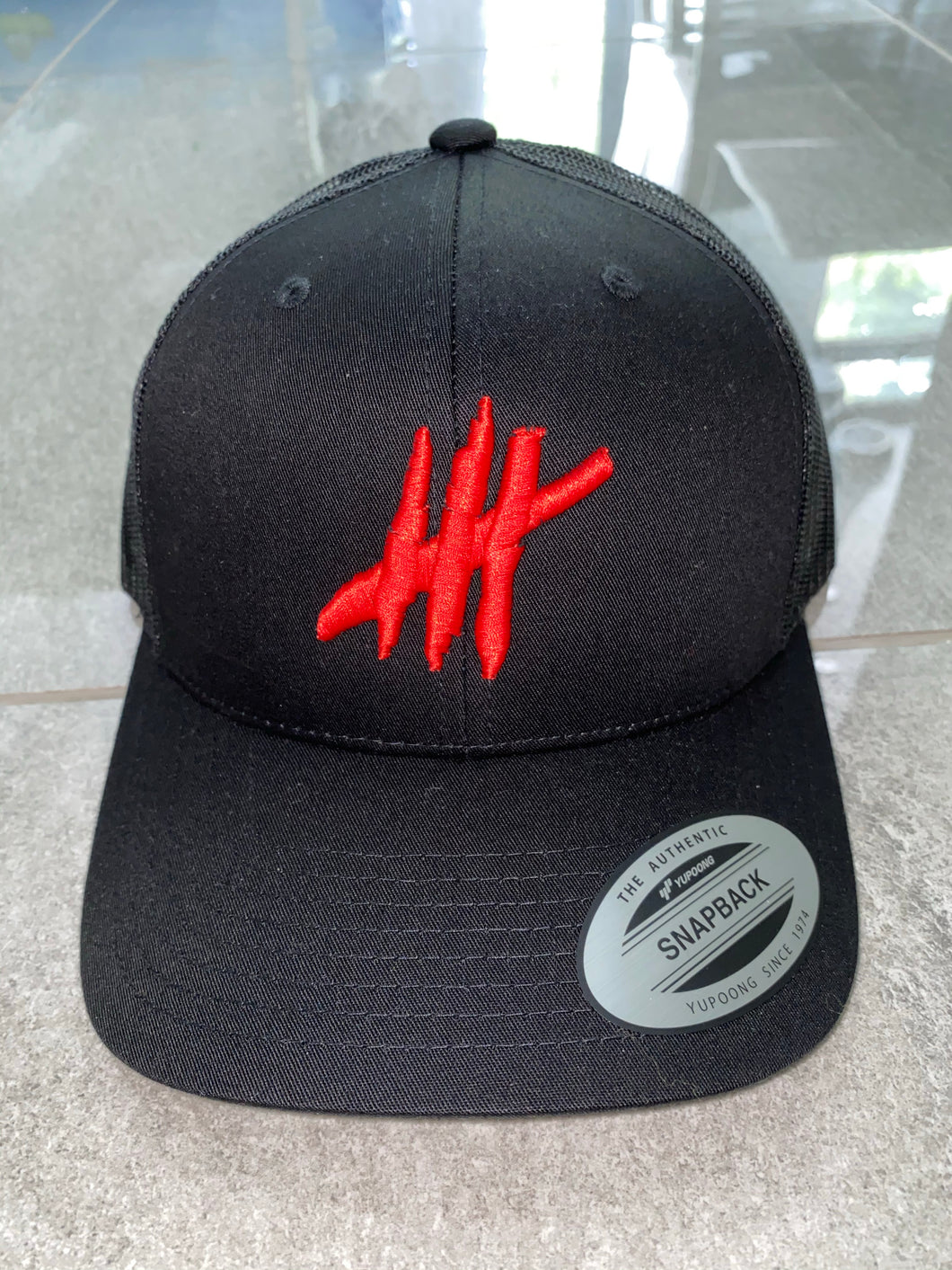 Black With Red logo