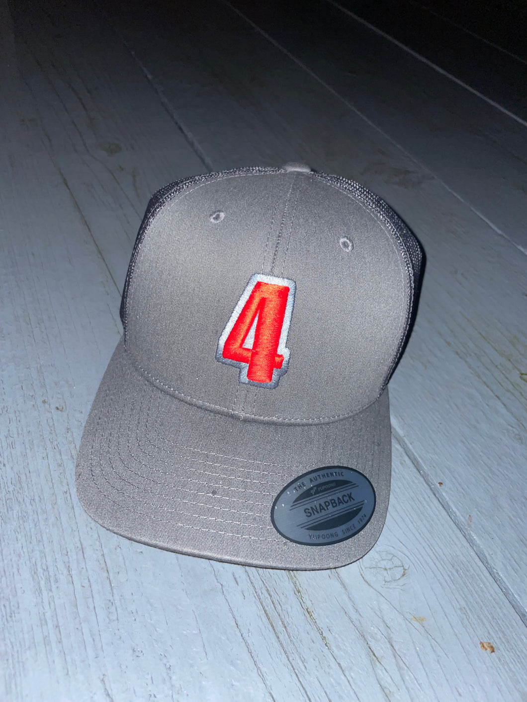 Grey trucker cap with red & grey logo